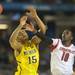 Michigan sophomore Jon Horford is fouled by Louisville junior Gorgui Dieng in the first half at the Georgia Dome in the national championship game in Atlanta on Monday, April 8, 2013. Melanie Maxwell I AnnArbor.com